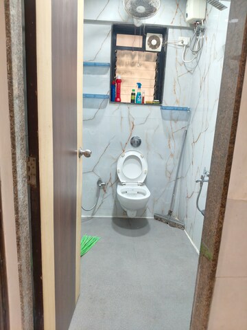 Bathroom in 2 BHK Apartment at Palash Towers, Andheri West – for Rent