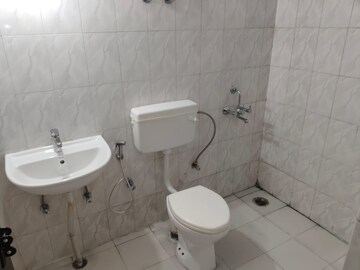 Bathroom in 3 BHK Apartment at Nilaya Greens, Raj Nagar Extension – for Sale