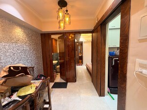 Living Room in 1 BHK Apartment at Lodha Amara, Kolshet Road – for Rent