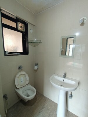 Bathroom in 2 BHK Apartment at STG Marigold Siddheshwar Garden, Dhokali – for Rent