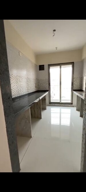 Kitchen in 2 BHK Apartment at Shelter Riverside, Taloja – for Rent