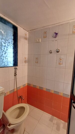Bathroom in 2 BHK Apartment at Naupada – for Rent