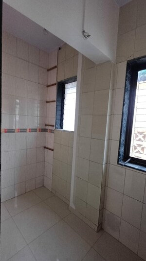 Bathroom in 2 BHK Apartment at Naupada – for Rent
