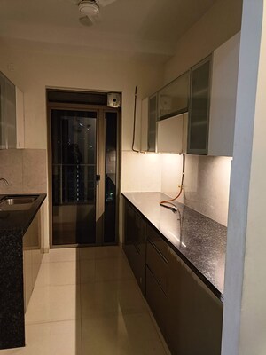 Kitchen in 2 BHK Apartment at Kalpataru Paramount, Kapur Bawdi – for Rent