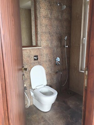Bathroom in 3 BHK Apartment at Omkar Alta Monte, Malad East – for Rent