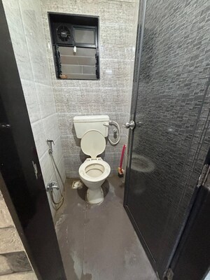 Bathroom in 1 BHK Apartment at Sahayog Complex, Manpada – for Rent