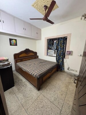 Bedroom in 2 BHK Builder Floor at Kalkaji – for Rent