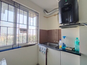 Kitchen in 2 BHK Apartment at Ozone Evergreens, Harlur – for Rent