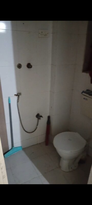 Bathroom in 2 BHK Apartment at Raunak Unnathi Woods Phase 4 And 5, Ghodbunder Road – for Rent