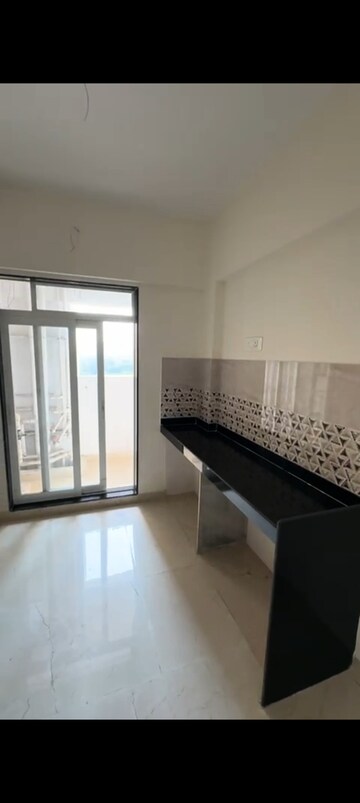 Kitchen in 4 BHK Apartment at Mahavir Square, Manpada – for Rent