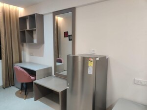Kitchen in Studio Apartment at Okay Plus Solitaire Suites, Ramnagariya – for Sale