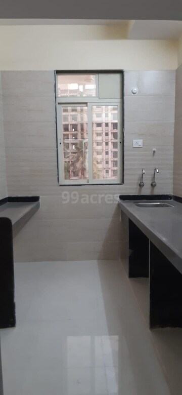 Kitchen in 2 BHK Apartment at Patel Prayosha Pramukh Sadan, Ambernath West – for Sale