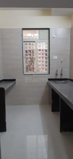 Kitchen in 2 BHK Apartment at Patel Prayosha Pramukh Sadan, Ambernath West – for Sale