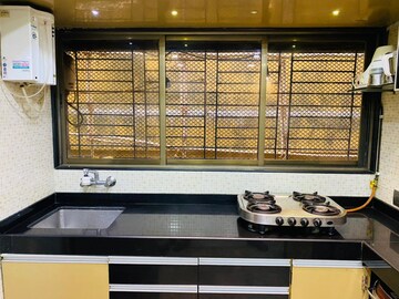 Kitchen in 4 BHK Apartment at Makhdoom Sea Palace, Mahim – for Sale