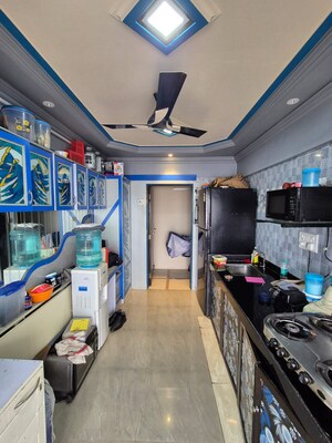 Kitchen in 4 BHK Apartment at Makhdoom Sea Palace, Mahim – for Sale