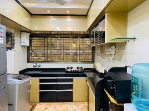 Kitchen in 4 BHK Apartment at Makhdoom Sea Palace, Mahim – for Sale