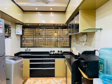 Kitchen in 4 BHK Apartment at Makhdoom Sea Palace, Mahim – for Sale