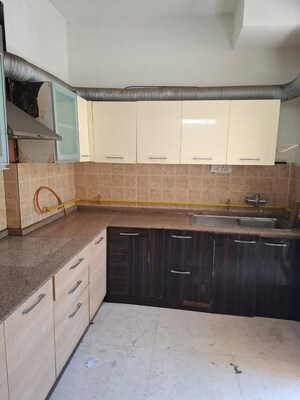 Kitchen in 4 BHK Builder Floor at DLF Royale Residences, Dlf Phase I – for Sale