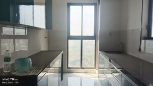 Kitchen in 2 BHK Apartment at Raymond Ten X Habitat, Pokhran Road No Two – for Rent