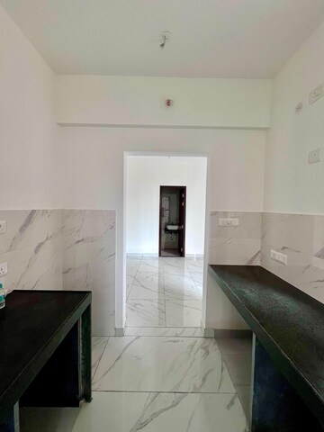 Kitchen in 1 BHK Apartment at Raymond Ten X Habitat, Pokhran Road No Two – for Sale