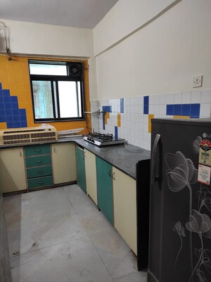 Kitchen in 1 BHK Apartment at Jeevan Sahar CHS, Andheri East – for Rent