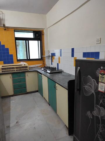 Kitchen in 1 BHK Apartment at Jeevan Sahar CHS, Andheri East – for Rent