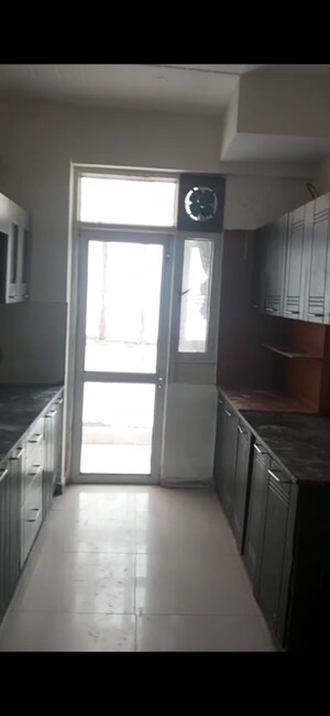 Kitchen in 3 BHK Apartment at Prateek Wisteria, Sector 77 – for Rent