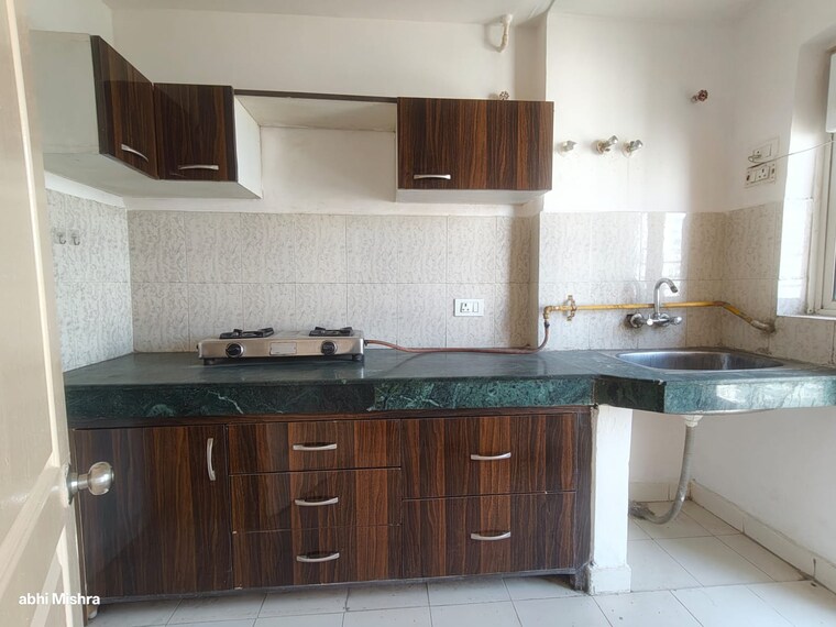 Kitchen, paras-tierea 2 Bedroom 825 Sq.Ft. Apartment In Sector 137 Noida 9542524