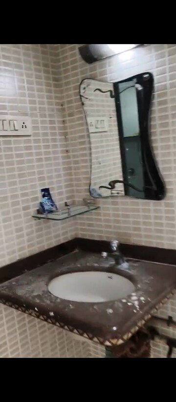 Bathroom in 1 BHK Apartment at Sadhana Chs Tilak Nagar, Tilak Nagar – for Rent