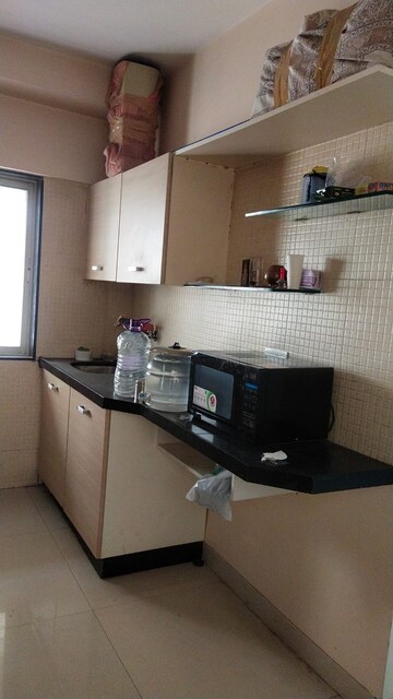 Kitchen in 3 BHK Apartment at Karan Palms, Warje – for Sale