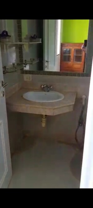 Bathroom in 2 BHK Apartment at Hiranandani Meadows, Manpada – for Rent