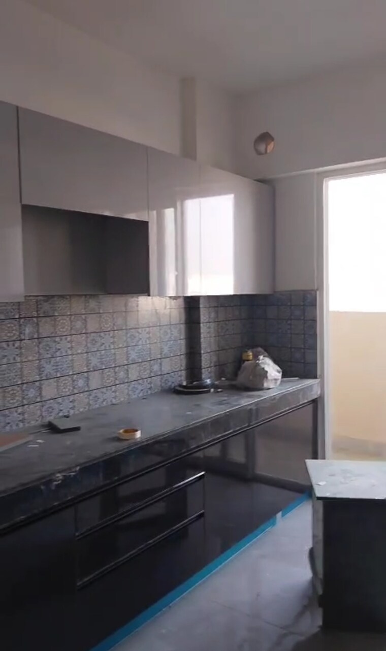 Kitchen, tulip-yellow 3 Bedroom 1704 Sq.Ft. Apartment In Sector 69 Gurgaon 9542978