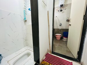 Bathroom in 3 BHK Apartment at Damodar Sankul, Hingne Khurd – for Sale