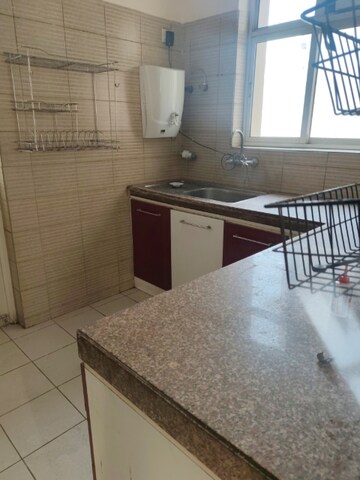 Kitchen in 2 BHK Apartment at 3C Lotus Boulevard, Sector 100 – for Rent