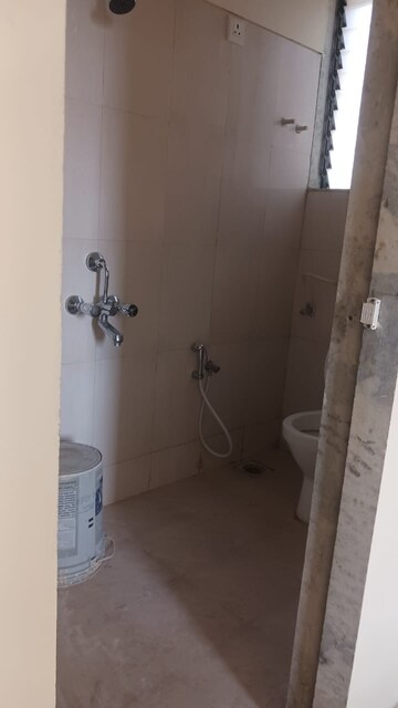Bathroom in 1 BHK Apartment at Paradigm Zenith Pushpanjali Residency Phase III, Ghodbunder Road – for Rent