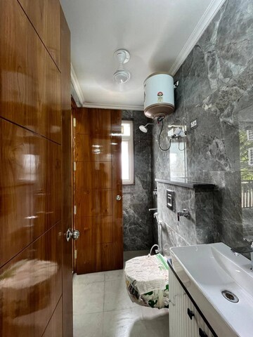 Bathroom in 3 BHK Builder Floor at Chattarpur – for Rent