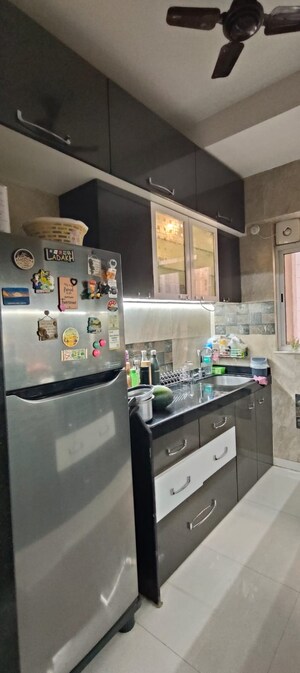 Kitchen in 1 BHK Apartment at Lodha Amara, Kolshet Road – for Sale