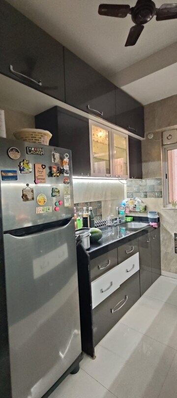 Kitchen in 1 BHK Apartment at Lodha Amara, Kolshet Road – for Sale