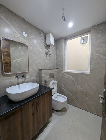 Bathroom in 2 BHK Apartment at Smart World Orchard, Sector 61 – for Sale