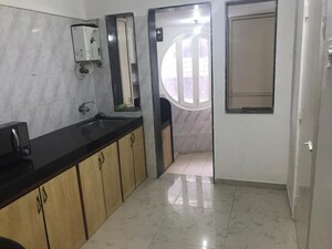 Bathroom in 2 BHK Apartment at Serenity Tower, Andheri West – for Rent