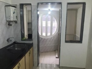 Bathroom in 2 BHK Apartment at Serenity Tower, Andheri West – for Rent