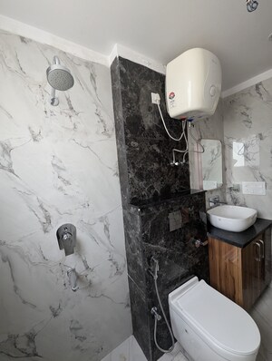 Bathroom in 3 BHK Apartment at Smart World Orchard, Sector 61 – for Sale