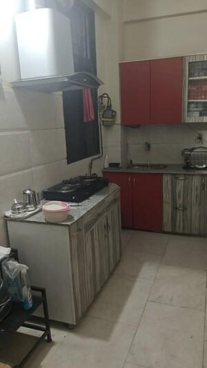 Kitchen in 2 BHK Apartment at Jaipuria Sunrise Greens, Ahinsa Khand 1 – for Rent
