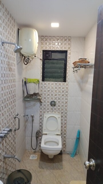 Bathroom in 2.5 BHK Apartment at Shree Darshan, Azad Nagar – for Rent