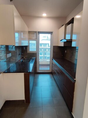 Kitchen in 3 BHK Apartment at Elite Golf Green, Sector 79 – for Rent