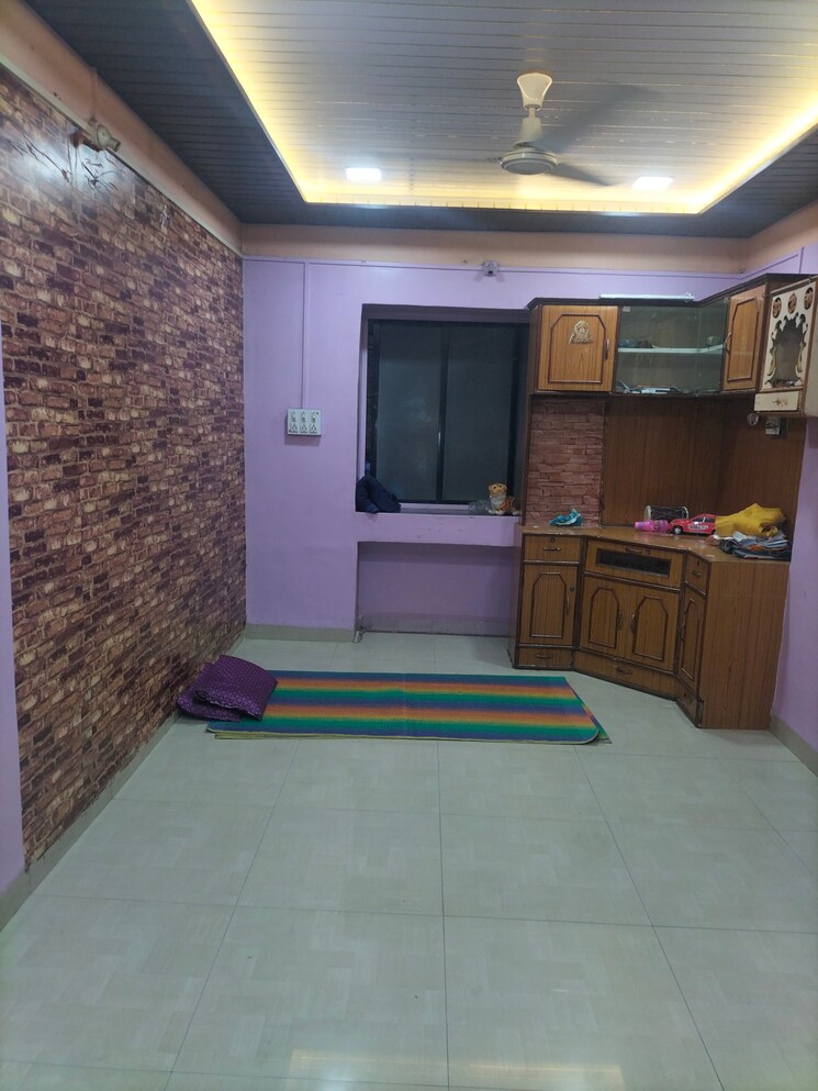 Living Room, shri-datta-nandnavan-building 1 Bedroom 560 Sq.Ft. Apartment In Dhankawadi Pune 9543791