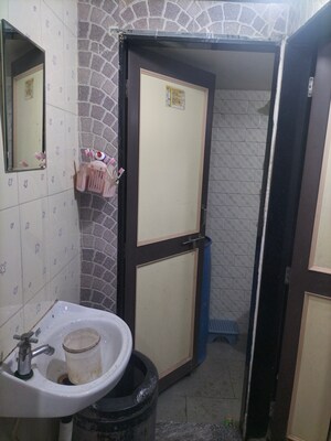 Bathroom in 1 BHK Apartment at Shri Datta Nandnavan Building, Dhankawadi – for Rent