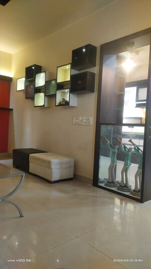 Living Room in 2 BHK Apartment at Magarpatta Sylvania, Hadapsar – for Sale