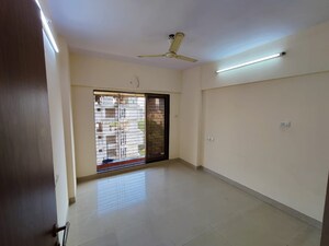 Room in 2 BHK Apartment at Tulsibaug CHS, Borivali West – for Rent