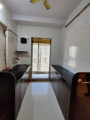 Kitchen in 2 BHK Apartment at Tulsibaug CHS, Borivali West – for Rent